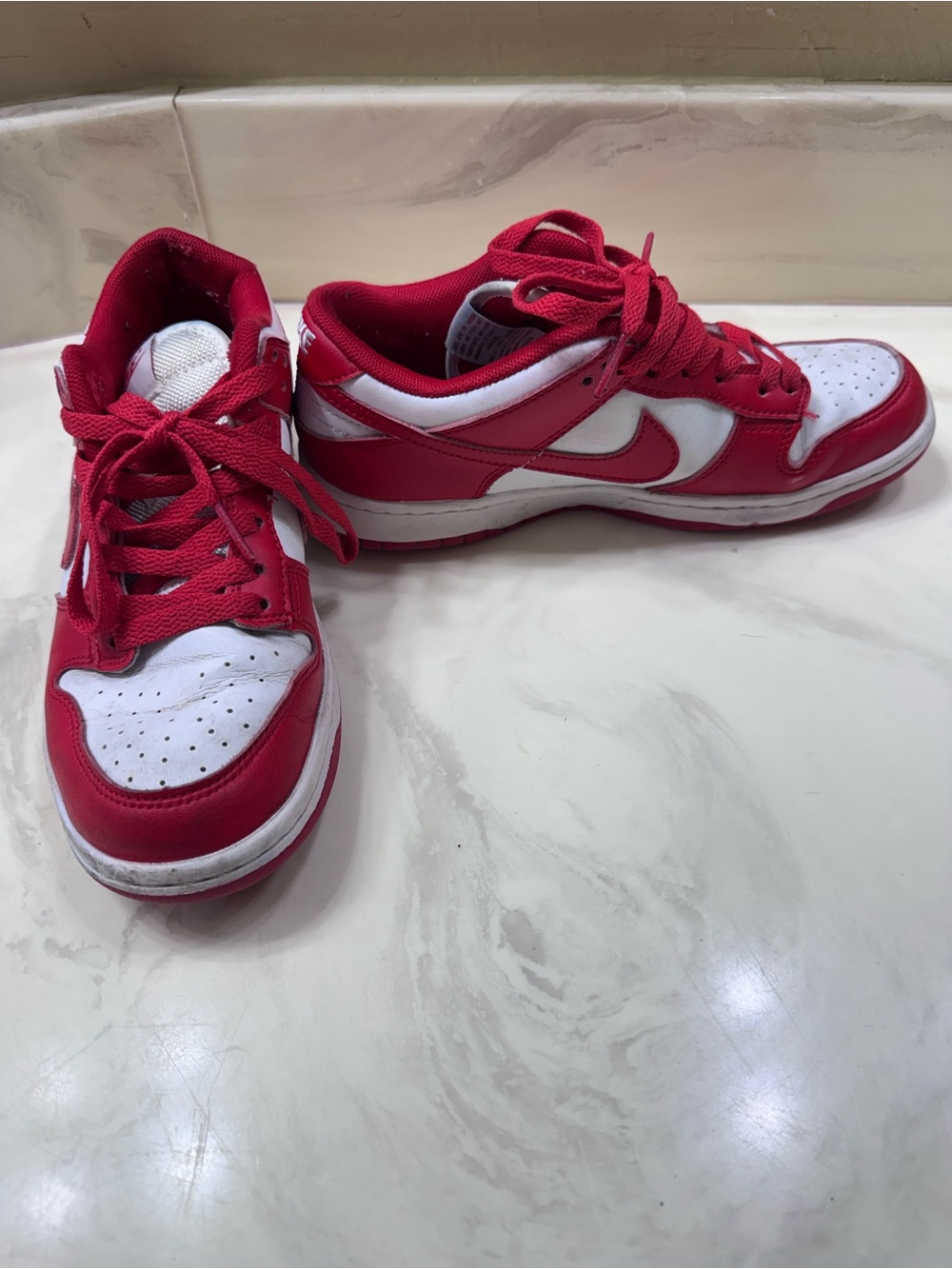 Nike Women's Red and White Dunk Low athletic shoe